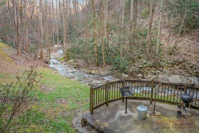 Rustic River resort grilling area