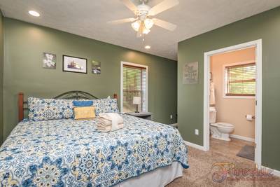 Amazing Grace lower level bedroom with king size bed