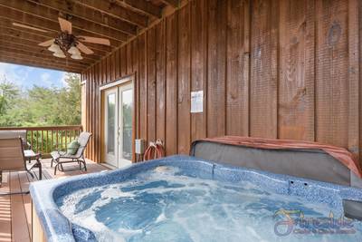 Amazing Grace lower level deck with hot tub