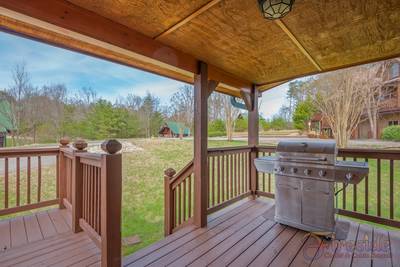 Amazing Grace covered entry deck with gas grill