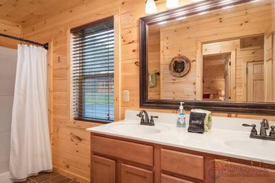 Lighthouse Harbor main level bathroom with walk-in shower