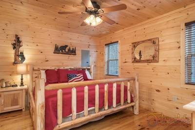 Lighthouse Harbor main level bedroom with king size bed