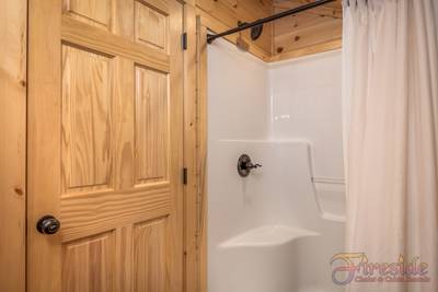 Lighthouse Harbor upper level open loft bathroom with walk-in shower