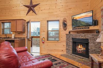 Lighthouse Harbor stone encased seasonal gas log fireplace
