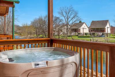 Lighthouse Harbor covered back deck with hot tub