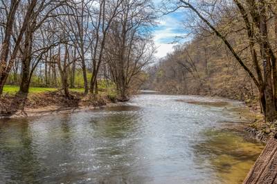 Lighthouse Harbor is located on the shore of the Little Pigeon River