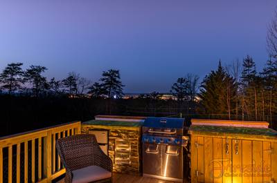 Winter Ridge outdoor kitchen with glowing countertops