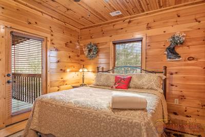 Winter Ridge main level bedroom one with king size bed