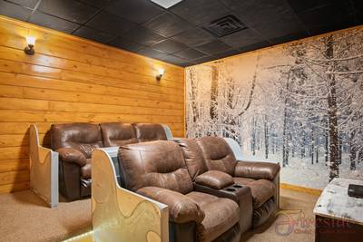 Winter Ridge lower level theater room with recliners