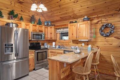Three Bears main level fully furnished kitchen and bar area