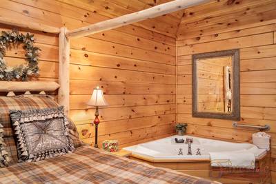 Three Bears main level bedroom 1 with in room whirlpool tub