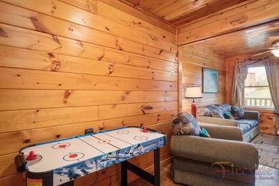 Three Bears lower level game room with air hockey table