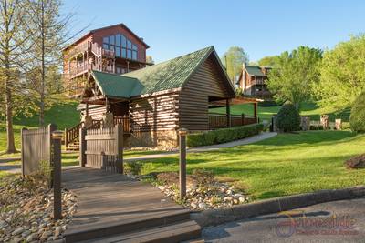 Cabins at the Crossing walking path bridge