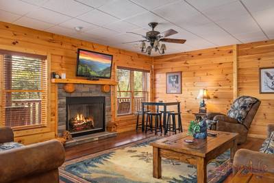 A Cabin of Dreams lower level sitting area with recliner