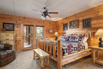 A Cabin of Dreams lower level bedroom with king size bed