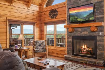 A Cabin of Dreams living room with rocking chair