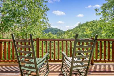 A Walk in the Clouds rocking chairs with view