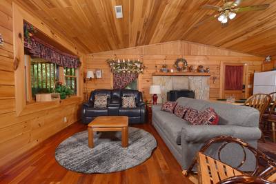 Walden Ridge Retreat living room with electric love seat recliner