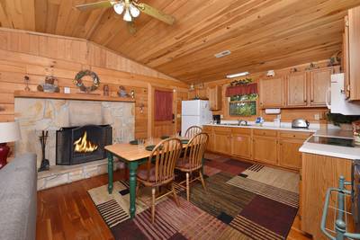 Walden Ridge Retreat dining area and seasonal wood burning fireplace