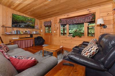 Walden Ridge Retreat living room with electric love seat recliners