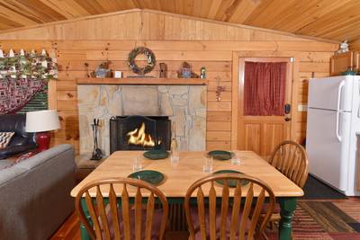 Walden Ridge Retreat living room with wood burning fireplace