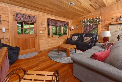 Walden Ridge Retreat living room with electric love seat recliner