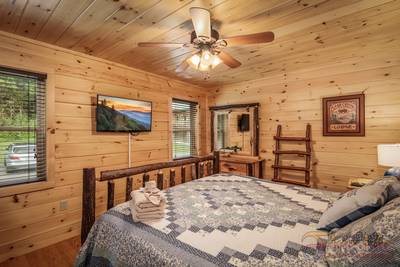 River Haven main level bedroom with 39-inch flat screen tv