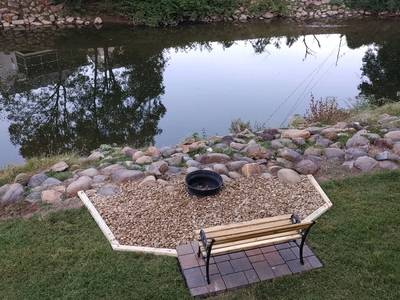 River Haven outdoor fire pit and bench