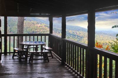 Old Glory covered deck with mountain views