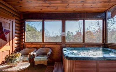 Another Day Inn Bearadise screened in porch with hot tub
