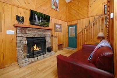 Country Charm living room with wood burning fireplace