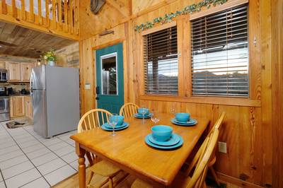 Country Charm dining area and fully furnished kitchen