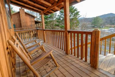 Country Charm wraparound deck with view