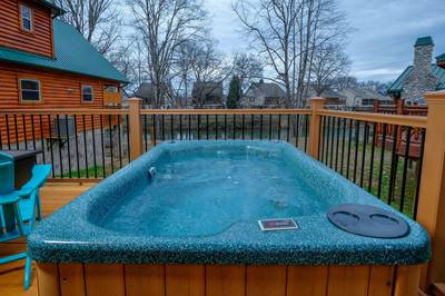 Dancing Waters back deck with hot tub