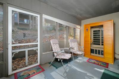 Under Ober screened in back patio with sauna