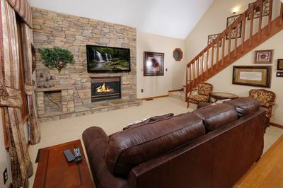 Adele's Retreat living room with 65-inch flat screen tv