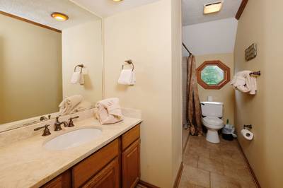 Adele's Retreat main level bathroom 1 with walk-in shower