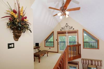 Adele's Retreat upper level loft area with balcony