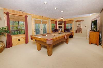 Adele's Retreat lower level game room with pool table