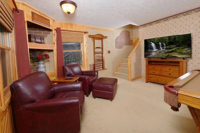 Adele's Retreat lower level game room with 2 leather chairs