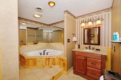 Adele's Retreat lower level bathroom 3 with whirlpool tub