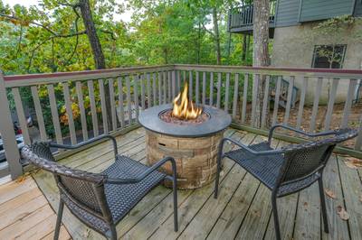 Adele's Retreat lower level covered deck with fire pit