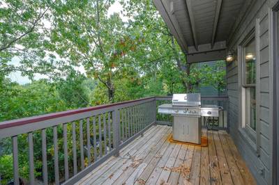 Adele's Retreat main level wraparound deck with gas grill