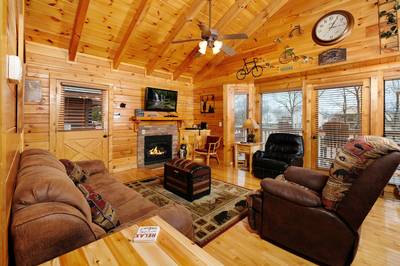 Down by the River living room with sleeper sofa