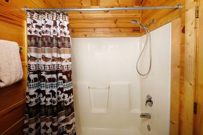 Down by the River bathroom one with tub/shower combo
