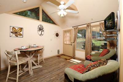 Sunset View Chalet sunroom with 40-inch TV