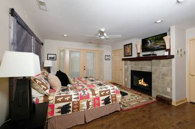 Sunset View Chalet bedroom with gas fireplace