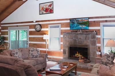 Pleasant View living room with wood burning fireplace