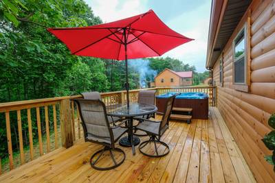 Dreams Come True back deck with table and chairs