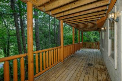 Timber Tree Lodge lower level covered back deck